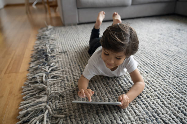Kid laying on rug | Yetzer Home Store