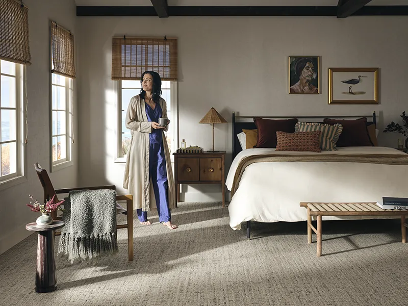 Women Standing in Bedroom with Carpet Flooring | Yetzer Home Store